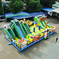 Terrain de jeu gonflable géant Safari Jungle Slide Obstacle Course Bounce House for Kids Outdoor Commercial Amusement Park Games