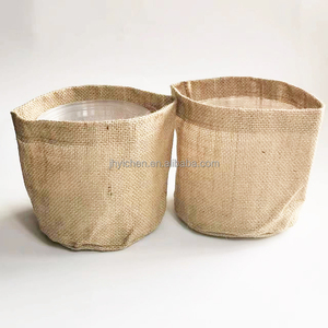 Vente en gros sac <span class=keywords><strong>de</strong></span> <span class=keywords><strong>jute</strong></span> <span class=keywords><strong>pour</strong></span> plantes design personnalisé sacs <span class=keywords><strong>de</strong></span> jardinage en <span class=keywords><strong>toile</strong></span> <span class=keywords><strong>de</strong></span> <span class=keywords><strong>jute</strong></span> à fond rond - Product Image 1