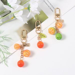Accessoires de pendentif porte-clés en résine, motif fruit de mandarine, style dessin animé pastoral, mignons et simples, pour sacs d'école, téléphones et écouteurs - Product Image 2
