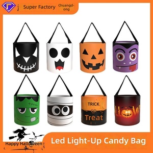 Bolsa de Halloween 3D iluminada para niños Xingtu, cubo de tela con luz LED para dulces, para recoger caramelos o reponerse de dulces - Product Image 1