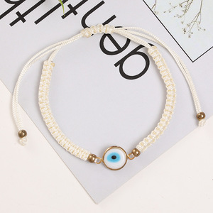 สร้อยข้อมือเชือกถักสีแดงดำชุบทอง 18K พร้อมตาปีศาจสีฟ้านำโชค ปรับขนาดได้ สำหรับผู้หญิงและผู้ชาย - Product Image 1