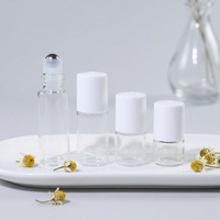 Flacon roll-on 5 ml en verre transparent pour parfum, attar, huile essentielle avec bille en acier inoxydable pour sérigraphie