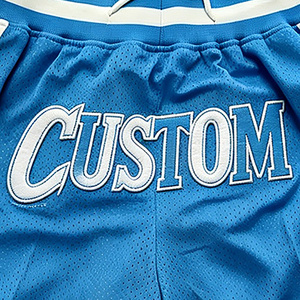 Pantalones Cortos de Baloncesto Azules Personalizados para Hombre con Franja Lateral Blanca, Logotipo Bordado, Cintura con Cordón Ajustable y Malla Transpirable - Product Image 3