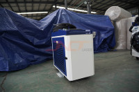 Nouvelle machine de nettoyage au laser à fibre portative industrielle 1500W pour l'élimination de la rouille et de la peinture sur les pièces métalliques et en aluminium de précision