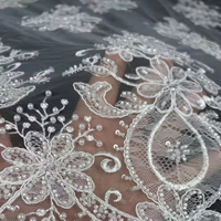 Tissu de dentelle française laser de haute qualité, blanc, cordonné, à haute densité, brodé avec des perles et des paillettes, pour robe de mariée