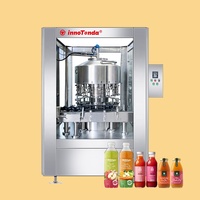 Machine de remplissage rotative automatique pour bouteilles en verre de jus de fruits