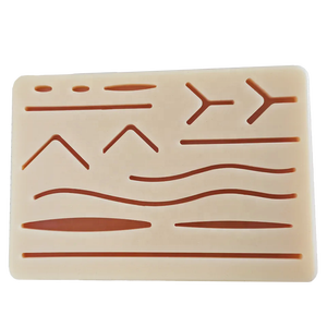 Almohadilla de silicona para sutura de heridas con 14 cortes, modelo de entrenamiento de sutura quirúrgica, modelo de piel humana traumática con cortes predefinidos - Product Image 5
