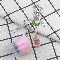 Nouveau design tendance : Porte-clés japonais mignon en forme de flan aux œufs rose et jaune, style Y2K, esthétique rétro métallique, accessoire perlé