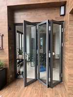 Porte d'entrée pliante en aluminium moderne, imperméable, en alliage d'aluminium et en verre, surface finie, design accordéon, balcon, patio, pliage, extérieur, villa