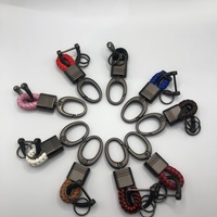 Porte-clés en corde tressée en cuir PU, porte-clés de voiture en alliage de zinc, lot en gros et vente en gros, porte-clés de voiture avec logo personnalisé, breloque de sac, fabrication OEM ODM