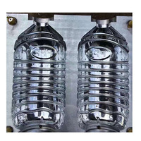 Ligne de production de bouteilles d'eau minérale en plastique soufflé entièrement automatique à grande vitesse, machine de soufflage de préformes en PET