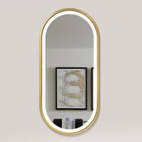 Espejo de Baño Inteligente Moderno y Popular con Iluminación LED Ajustable, Marco Ovalado Dorado de Lujo, Antivaho, para Salón
