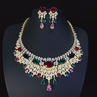 Parure de bijoux luxueuse plaquée or, comprenant un collier et des boucles d'oreilles en cuivre incrustés de pierres précieuses, forme goutte d'eau, pour femme, idéale pour les soirées et les mariages.