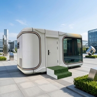 Maison capsule préfabriquée moderne de luxe, structure en acier de 40 pieds, maison capsule spatiale avec système solaire pour hôtel, camping, complexe hôtelier