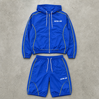 Ensemble décontracté pour homme personnalisé : Haut bleu à manches longues style survêtement avec fermeture éclair et short jaune à cordon de serrage – OEM ODM