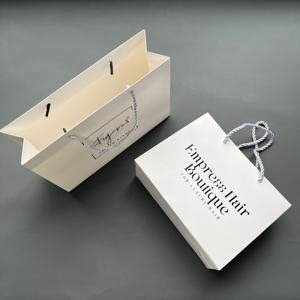 Bolsas de Compra de Papel Blanco Personalizadas con Impresión Negra - Empaque de Lujo para Extensiones de Cabello y Boutiques - Product Image 1