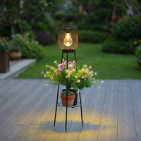Lanterne solaire trépied de jardin en maille noire mate, lumière jaune chaude, lampe décorative d'extérieur pour projets de jardin et de paysagisme