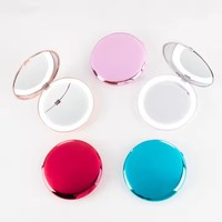 Miroirs à main bon marché lumière LED ronde beauté cosmétique 2X miroir de maquillage grossissant avec batterie rechargeable 400mah