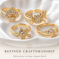 Großhandel Anlaufgeschützter 18K Vergoldeter Meerestier-Ringset für Damen mit Zirkonia, Muschel, Krabbe, Schildkröte, Delfin, Verstellbare Fingerringe