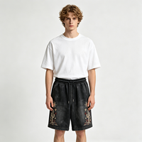 Shorts noirs délavés style vintage avec broderie cactus et soleil, tissu doux au toucher, streetwear décontracté d'été