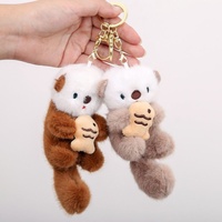 Gantungan Kunci Boneka Beruang Laut Kartun Baru Memegang Ikan Mainan Boneka Anjing Laut Bahan Poliester Dekorasi Ransel Unisex Grosir