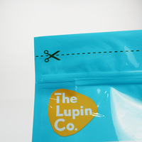 Pochette à fond carré en plastique de qualité alimentaire personnalisée de haute qualité fenêtre transparente pop-corn noix Soda craquelins Logo pour gelée