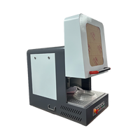 Machine de gravure laser UV 5W avec design de table et boîtier pour le marquage du bois, du contreplaqué, du MDF, du caoutchouc et du métal (refroidissement par eau)