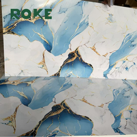 Panneau et panneau muraux de décoration intérieure en marbre alternatif d'usine OEM Revêtement UV en marbre imité Feuille de plastique PVC