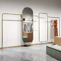 Porte-vêtements mural en métal doré, dernier cri, magasin de vêtements résistant, meilleure qualité