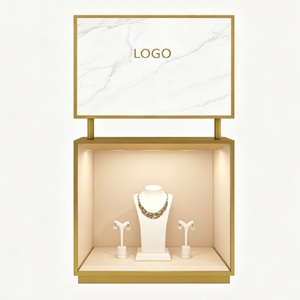 <span class=keywords><strong>Vitrina</strong></span> <span class=keywords><strong>de</strong></span> Exhibición <span class=keywords><strong>de</strong></span> Joyería <span class=keywords><strong>de</strong></span> Lujo en Oro y Mármol, Exhibidor <span class=keywords><strong>de</strong></span> Pedestal con Logotipo Personalizado e Iluminación LED para Boutiques - Product Image 1