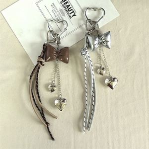 Modern and Simple Unique Design Leather Bow Heart <b>Keychain</b> Bag Pendant <b>Personality</b> Ins Tassel Decoration - Product Image 3