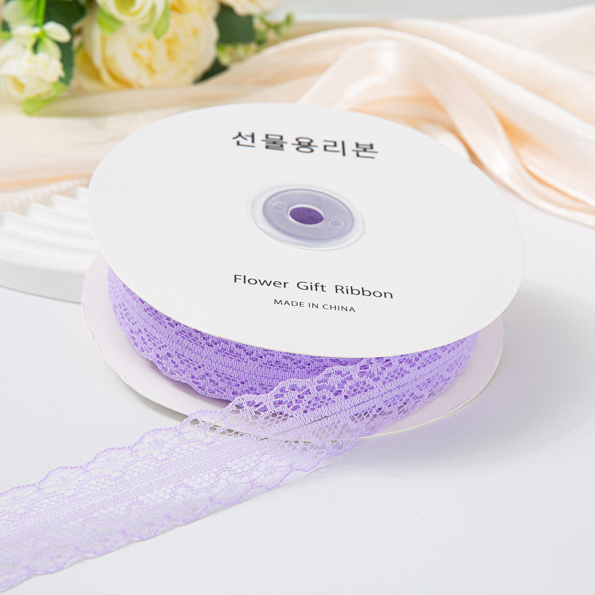 เข็มขัดลูกไม้สีม่วงไลแลค 3 ซม. 50 หลา ประมาณ 45 ม