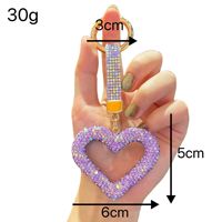 Porte-clés de voiture cœur creux entièrement serti de diamants, idéal pour accessoires de voiture, pendentifs de sac et cadeaux commémoratifs - Vente chaude