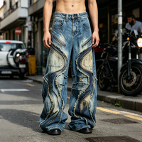 Jean déstructuré pour homme avec fermeture éclair ondulée, patchs, coutures effilochées, patchwork, coupe ample, jambe large, denim, mode streetwear avant-gardiste