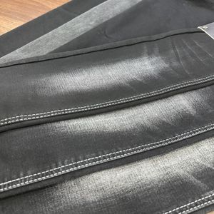 Tissu denim sergé extensible Lizhi NOIR en rouleaux, recyclé, résistant à l'abrasion et respirant pour vêtements de garçons et filles, et usage domestique - Product Image 1