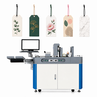Nueva Impresora Automática de Etiquetas UV de Cama Plana de Inyección de Tinta, Impresión en una Sola Pasada, 600dpi, CMYK, Ecológica, para Etiquetas Flexibles, Placas de Identificación, Etiquetas para Ropa