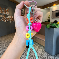 Nouveau porte-clés en corde tressée avec lettres colorées créatives, porte-clés en forme de cœur de dessin animé à la mode, accessoire