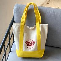 Sac fourre-tout en toile mini pastel réutilisable avec logo brodé personnalisé et poche pour un usage quotidien