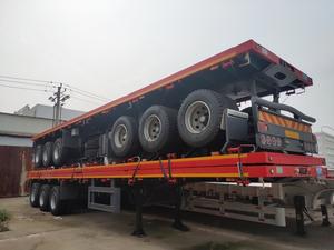 Semi-remorque à plateau plat 4 essieux pour le transport de conteneurs, personnalisable avec un plateau bleu - Product Image 2