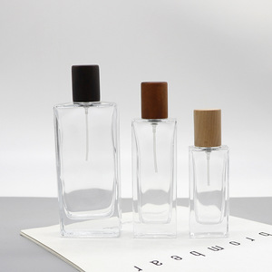 Flacon de parfum en verre pulvérisé à l'air comprimé de 50 ml, emballage de luxe personnalisé en gros avec étiquette adhésive - Product Image 1