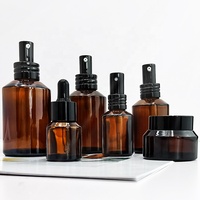 Épaule en pente ambre noir ensemble de soins de la peau bouteille de lotion contenants d'emballage de cosmétiques avec pot compte-gouttes noir avec couvercle