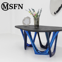 MSFN Direktvertrieb Luxuriöser Moderner Kunst-Esstisch Skulpturale Gesinterte Steinplatte Verschlungene Edelstahlbeine Apartment