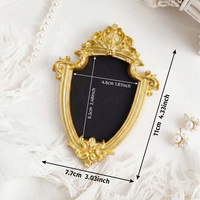 Cadre photo vintage baroque européen en résine dorée écologique, motif sculpté orné, idéal pour les cadeaux de mariage et la décoration de table