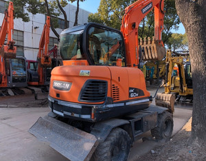 Doosan Dx60W Dx60 Dx80 Dx140 Dx150 Dx210 Doosan Dx140 Pelleteuse sur pneus d'occasion - Product Image 3