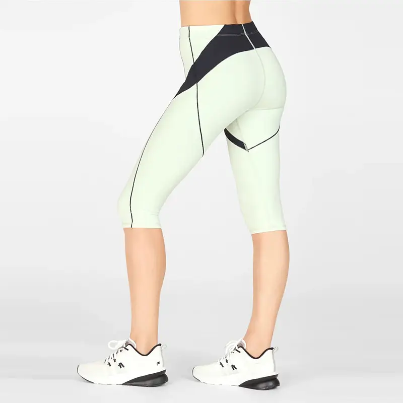 Spor atlet 3/4 Leggin Fabletics tasarımcı cep egzersiz Yoga kaprileri pantolon yüksek Waisted bayan Capri tayt