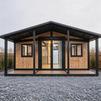 En promotion : Maison conteneur en acier extensible avec terrasse double niveau, design contemporain, garantie 5 ans, installation sur site