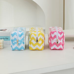 Hot Selling Ladies Fashion Custom Logo Makeup Case PVC Wavy Patter Zipper Cosmetic Bag - Product Image 5