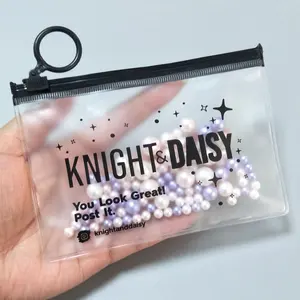 Fashionable PVC zipper bag for packing frosted cosmetic zipper pouch with ring for your own logo.