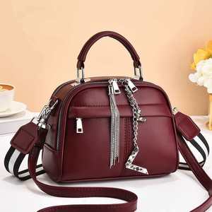 Women's Designer Handbag Large Capacity and High Quality Zip Closure Rivet Decoration Crossbody Bags - Product Image 1