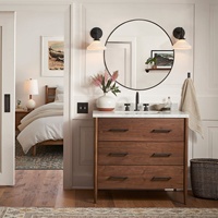 Meuble-lavabo de salle de bain de style moderne du milieu du siècle avec dessus en marbre, pieds coniques autoportants, grand tiroir de rangement et armoire en bois massif